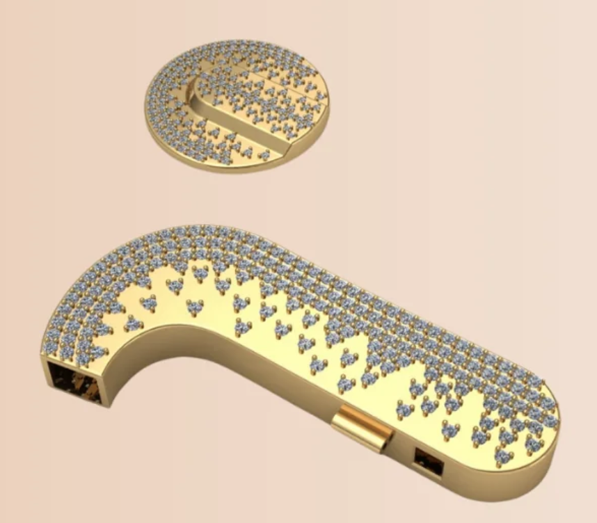 Gold cochlear cover with silver diamanté